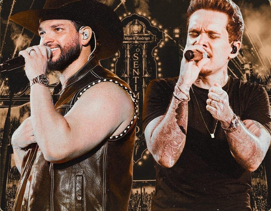 Felipe e Rodrigo cantando ao vivo no palco